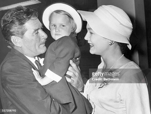 Family shot of Errol Flynn with his wife, Patrice Wymore, and their daughter, Arnella.