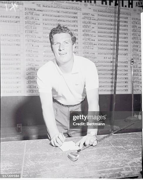 Miami Beach, Florida: Led First Round Of Miami Beach Open. Peter Thomson of Melbourne, Australia, checks his score after shooting a seven-under-par...