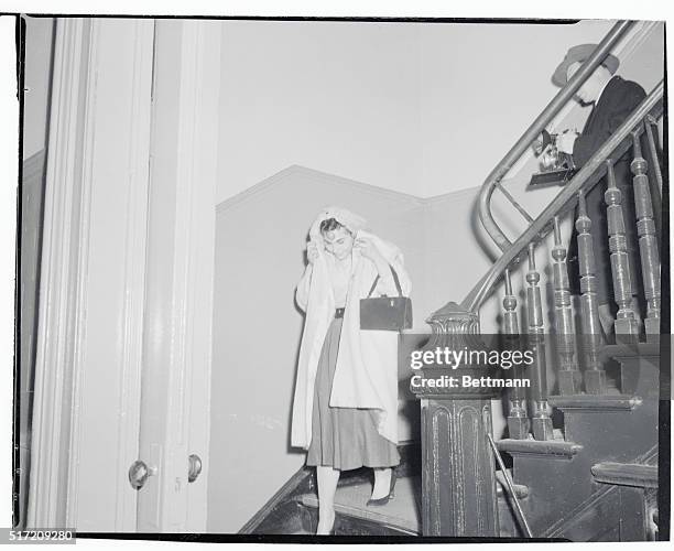 Pretty salesgirl, Estelle Gardner, leaves the East 67th Street Police Station after being questioned in connection with the death of international...
