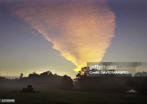 This photo taken 12 September 2001 shows the crash site of United Airlines Flight 93 in Shanksville, PA. The plane from Newark, NJ, bound for San...