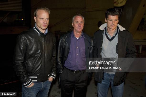 Dennis Bergkamp, Johan Cruyff and Wim Jonk pose on March 30, 2011 at the Amsterdam ArenA. The board of directors of Ajax resigned during a special...