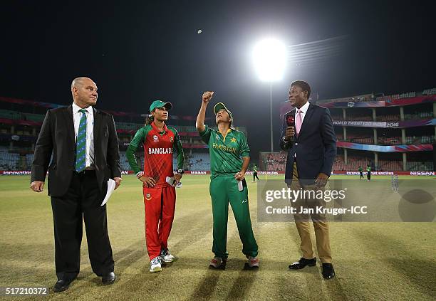 Sana Mir, Captain of Pakistan toss the coin with Jahanara Alam, Captain of Bangladesh looking on during the Women's ICC World Twenty20 India 2016...