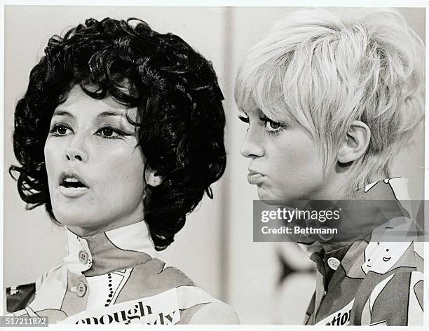 Guest star France Nuyen sings out in tribute to the Fourth Estate while serious regular Goldie Hawn gives the matter thoughtful consideration on...