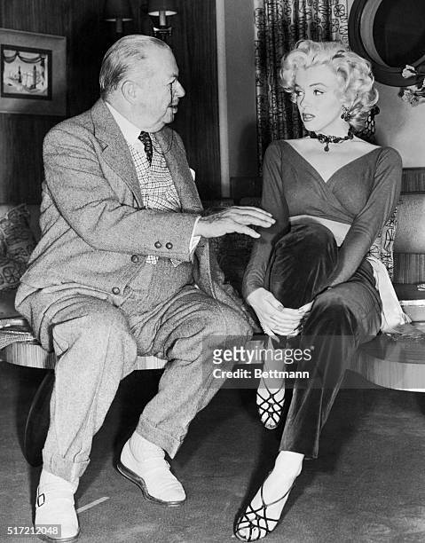 Marilyn Monroe and Charles Coburn Sitting and Talking.