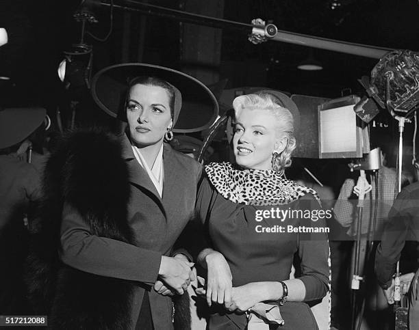 Marilyn Monroe and Jane Russell on the set of Gentleman Prefer Blondes.