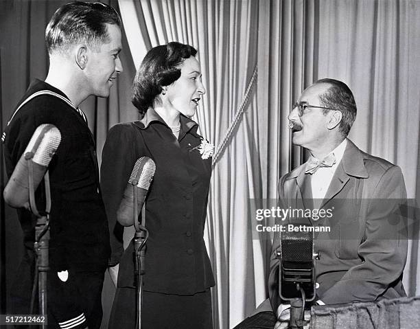 Hollywood, California: Gene Scarcliff, Coast Guardsman and Nancy Dunn, daughter of the commanding officer of Ft. MacArthur, San Pedro, California...