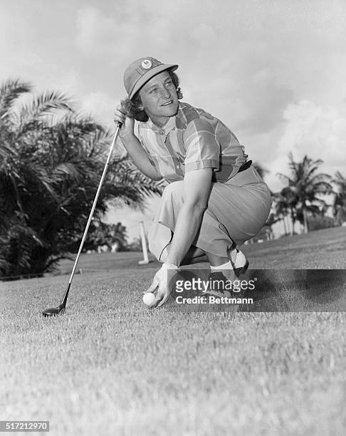 Portrait of Babe Zaharias, who won the Weathervane Tournament at the Normandy Isle Country Club today. Babe is shown here teeing up.