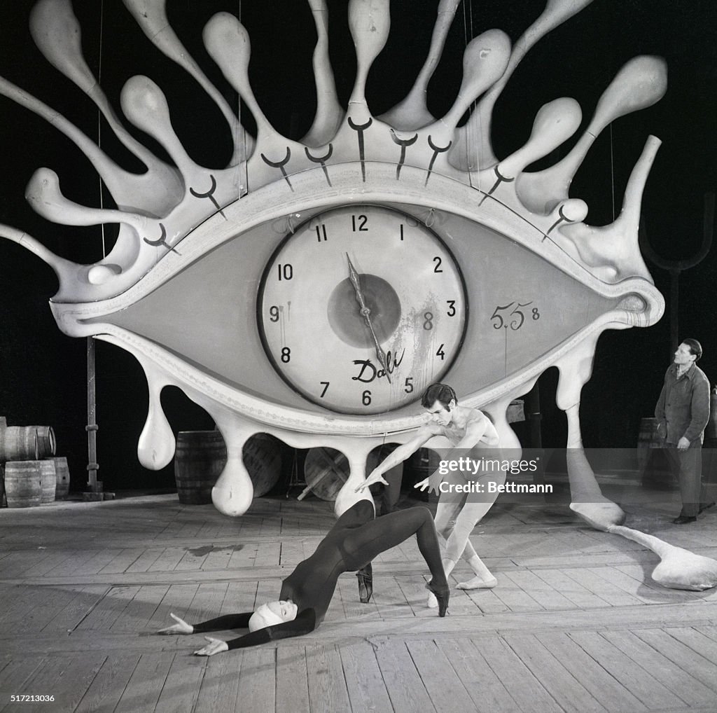 Ballerina And Partner Rehearse;Dali Clock