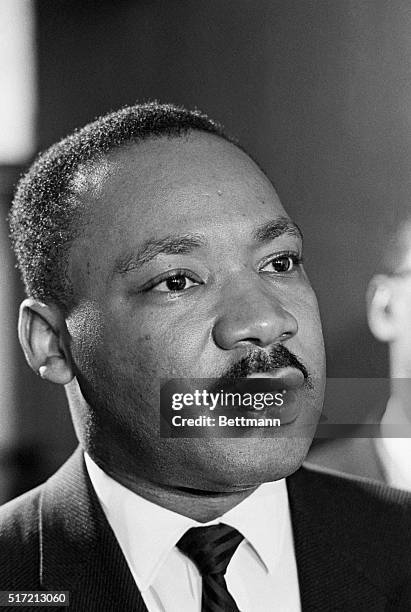 Montgomery, AL: The Reverand Martin Luther King at press conference. Close of Head while speaking.