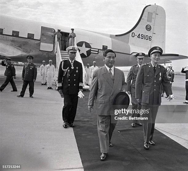 Taipei, Formosa: Vietnamese President Ngo Dinh Diem , is greeted upon his arrival at the airport of the capital city of Taiwan by Chinese Nationalist...