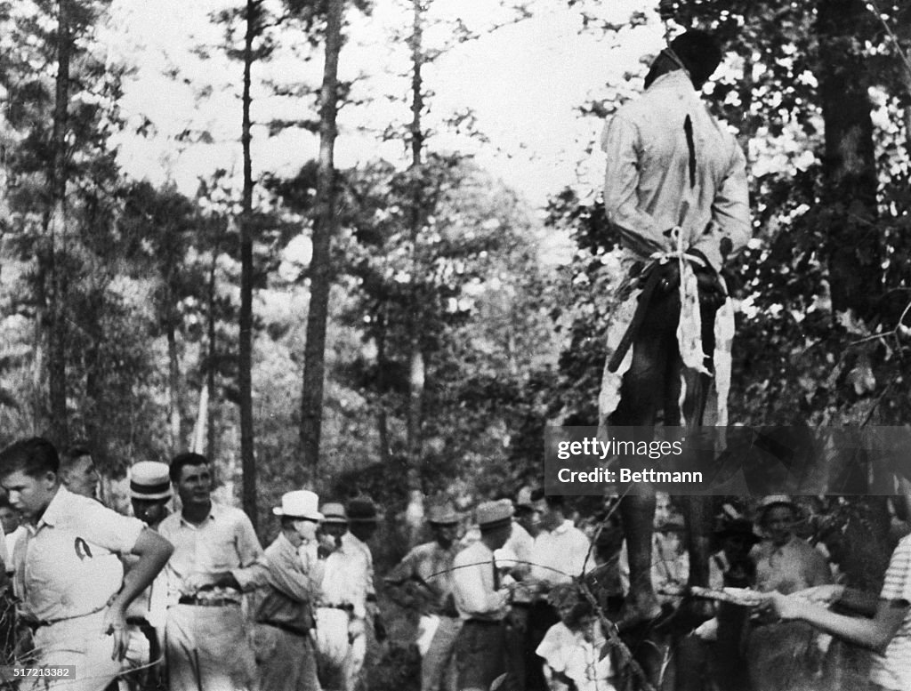 Lynching Victim Hangs Above White Crowd