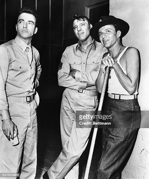 Frank Sinatra poses with From Here to Eternity costars Montgomery Clift and Burt Lancaster. All three were nominated for Academy Awards; Sinatra won...