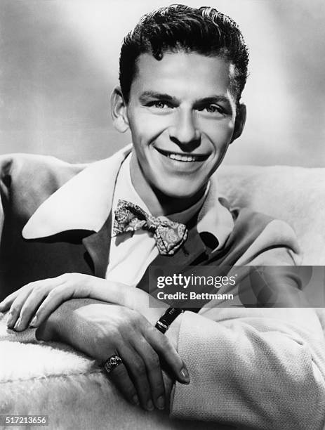 Frank Sinatra , American singer and actor. Won an Oscar for the 1953 film, "From Here To Eternity". Undated publicity still photo, headshot with...
