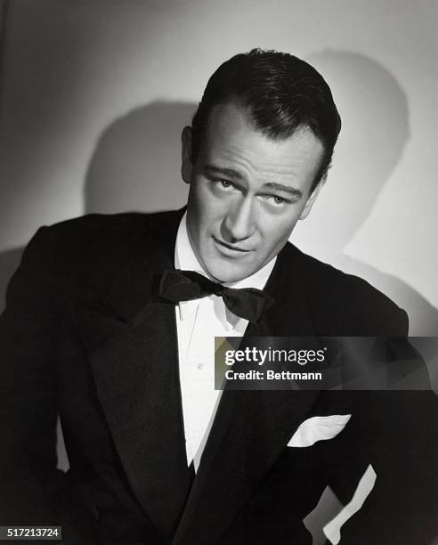 Actor John Wayne portrays attorney Lynn Hollister in the 1941 motion picture A Man Betrayed.