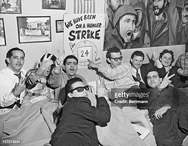 New York, NY-Some of the 14 men and four women on a hunger strike at the headquarters of the "Comite Ortodoxo," followers of Cuban rebel leader Fidel...