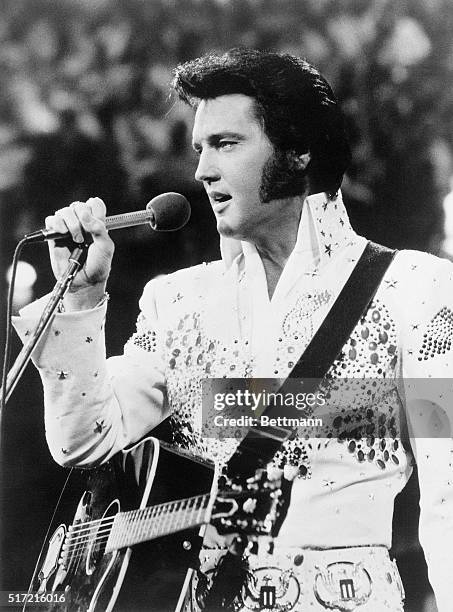 Elvis Presley, the hip-swinging truck driver who became the world's most famous rock n' roller, died at his Graceland mansion, 8/16, apparently of a...