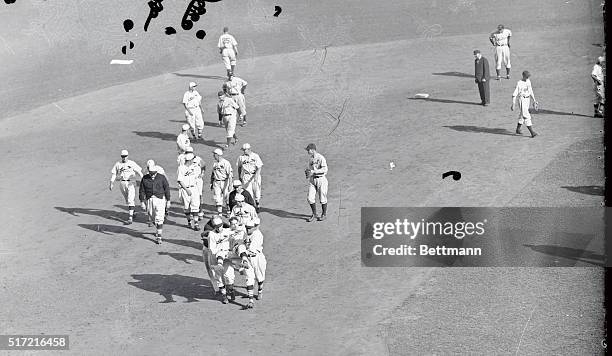 Jerome "Dizzy" Dean, droll pitching ace of the St. Louis Cardinals, was struck squarely on the head by a ball thrown by Rogell, Tiger shortstop,...