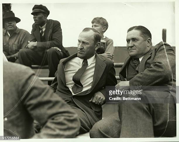 Joe McCarthy and Art Fletcher of the Yankees scouting Detroit at Boston-Detroit spring training game.