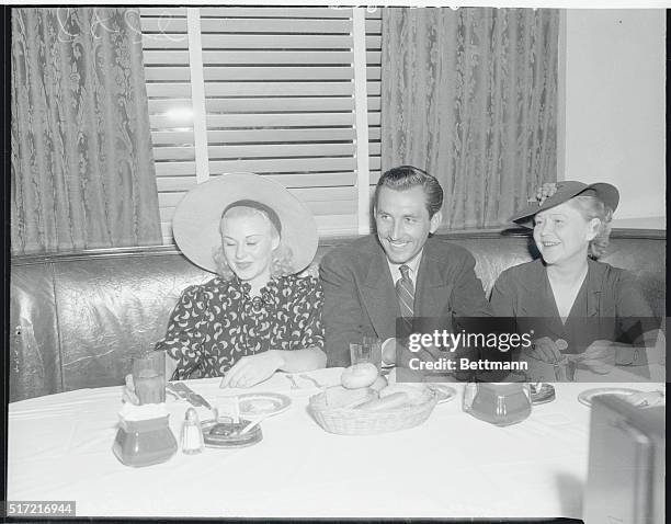 Ginger Rogers, Earl Eby, actor-producer and Ginger's mother at the Brown Derby.