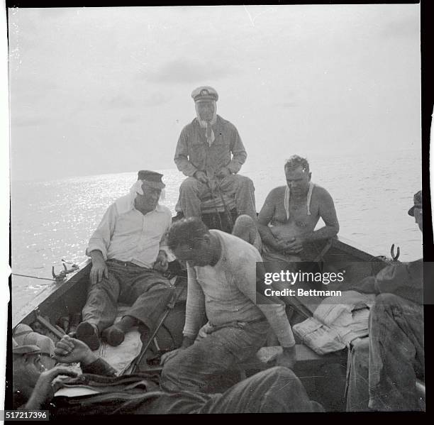 Captain Vincent P. Arkins and members of his crew are pictured in lifeboat No. 1 in which they escaped from the sinking American ship "Leigh" after...