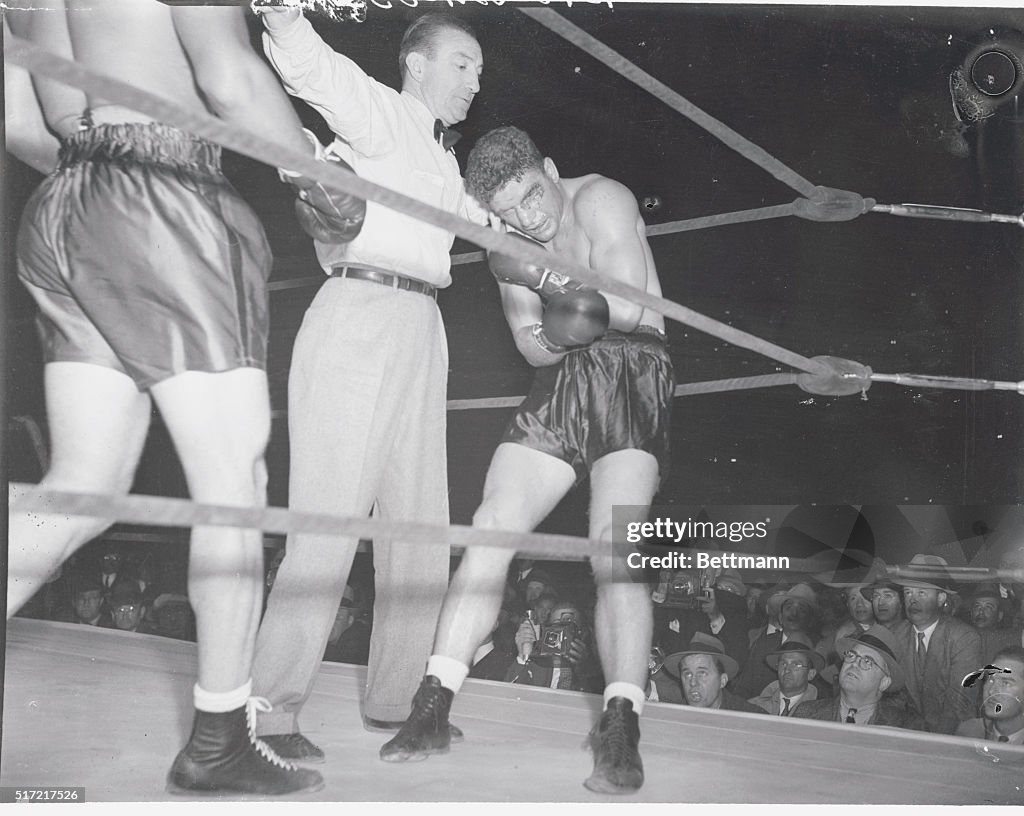 Referee Stopping Fight