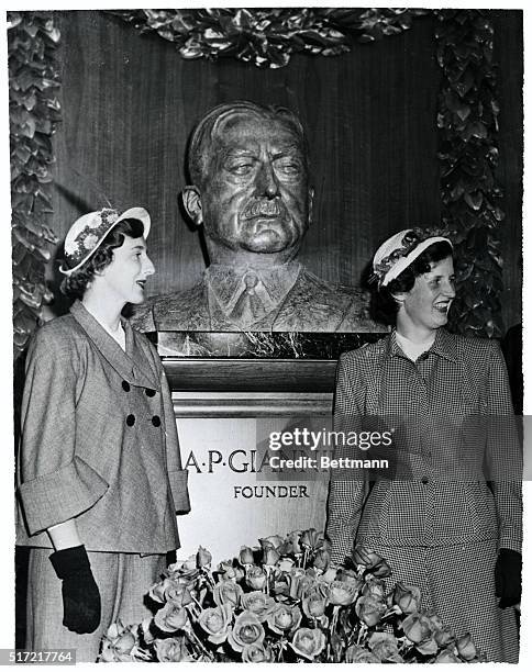 Framed by granddaughters Anne and Virginia Giannini, a bust of the late A.P. Giannini, the well-known banker, is unveiled at the main branch of the...