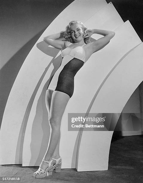 Marilyn Monroe posing as "Miss Morale of the Marine Corps".