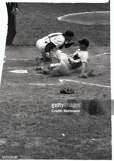 Senators' John Ostrowski is out at home plate in the fourth frame of the game against the Yanks in New York, June 29. Yank Jerry Coleman took Al...