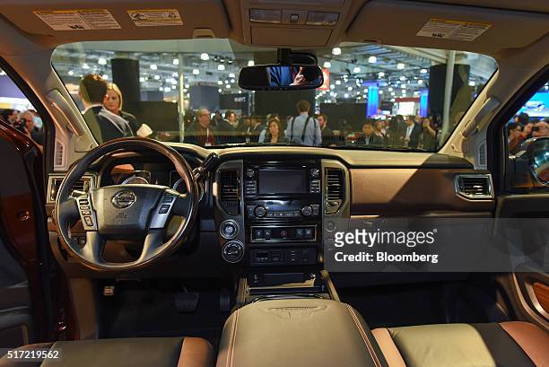 The interior of a 2017 Nissan Motor Co. Titan pickup truck is seen during the 2016 New York International Auto Show in New York, U.S., on Thursday,...