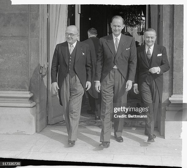 After presenting his credentials, new American ambassador to France C. Douglas Dillon is flanked by French President C. Douglas Auriol and French...