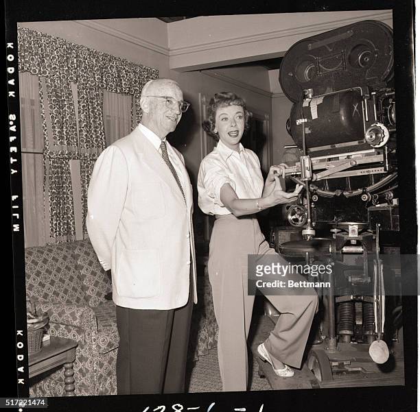 Hollywood, CA- Actress Ida Lupino, engaged in directiong a motion picture entitled "The Bigamist", is visited on the set by Alan Dwan, director who...