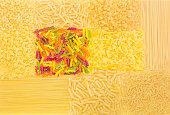 Background of several uncooked pasta different varieties