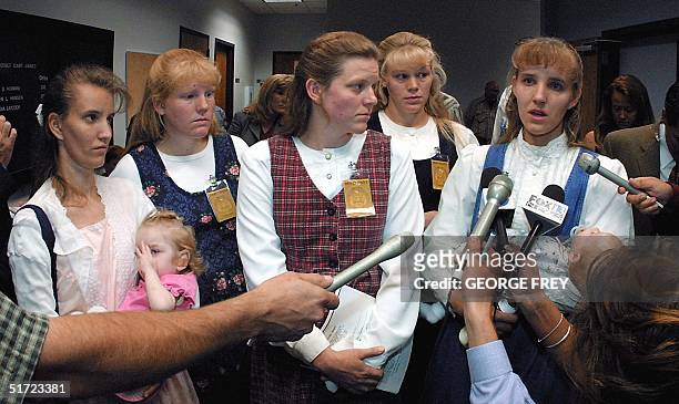 The five wives of polygamist Tom Green talk with reporters outside Fourth District Court after their husband was sentenced to two five-year...