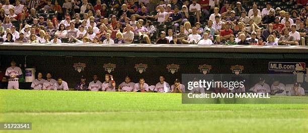 Boston Red Sox players watch from the bench during the eighth inning of their 8-3 loss to the Cleveland Indians on 28 August, 2001 at Jacobs Field in...