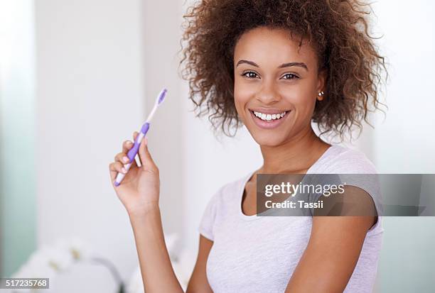only brush the teeth you want to keep - keep home clean stock pictures, royalty-free photos & images