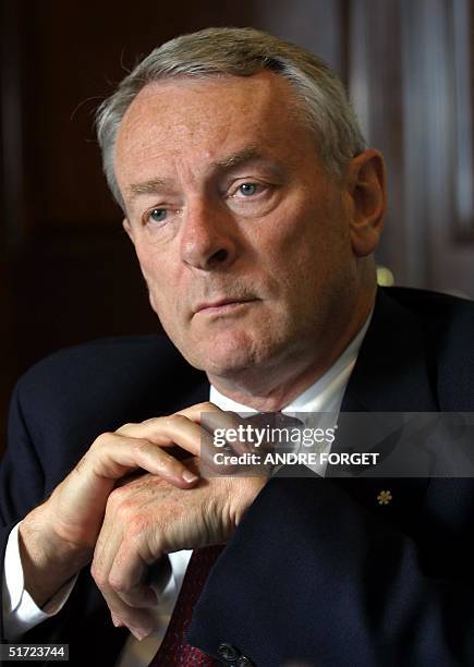 Canadian International Olympic Committee member and IOC presidential candidate Dick Pound ponders a question during an interview in Montreal June 29...