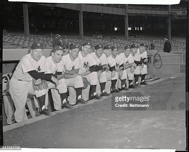 Manager Casey Stengel of the New York Yankees, who scored a personal triumph in bringing his team in first for the fifth straight time, poses with...