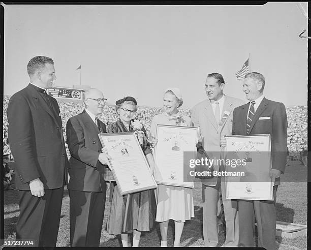 The national Football Hall of Fame presentation on October 17th at the Notre Dame Pittsburgh game is shown in this photo. From left to right is...