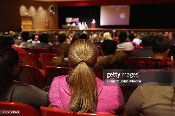 Students at Fitch Senior High School listen during a presentation in the school auditorium to educate them about the dangers of opioid painkiller...