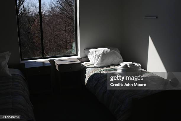 Bed awaits the arrival of a new drug addict at a substance abuse treatment center on March 22, 2016 in Westborough, MA. The new 100-bed residential...