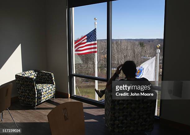 Drug addict in recovery looks out from a substance abuse treatment center on March 22, 2016 in Westborough, MA. The new 100-bed residential rehab...