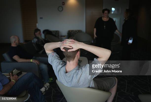 Drug addicts in recovery take part in a group therapy session at a substance abuse treatment center on March 22, 2016 in Westborough, MA. The new...