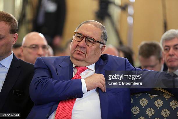 Russian billionaire Alisher Usmanov, listens during a panel session at the annual meeting of the Russian Union of Industrialists and Entrepreneurs...