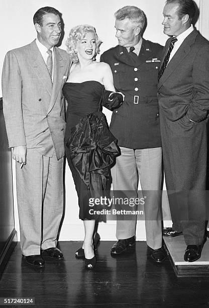 Starfilled Gathering. Hollywood: Former Yankee star Joe DiMaggio and screen sizzler Marilyn Monroe are guests at an informal reception given by...