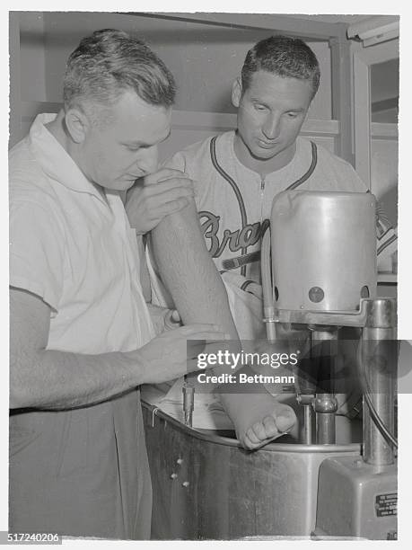 While the Milwaukee Brave's get set to go out on the diamond against the Dodgers at Ebbets Field, a "benched" Bobby Thomson who broke his ankle early...