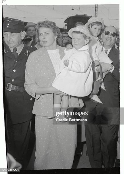 There's no such thing as traveling light for actress Ingrid Bergman, who's arriving in Munich with husband, Italian director Roberto Rossellini, with...