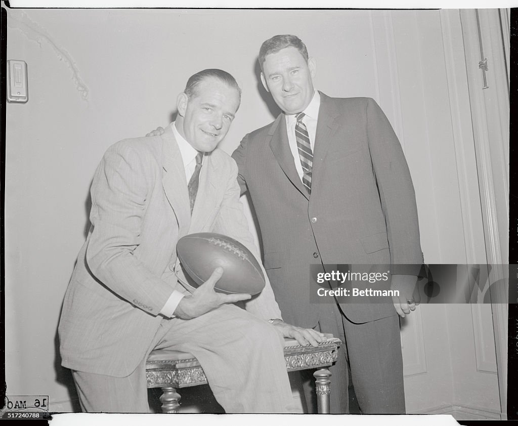 Frank Reagan and Ambrose Dudley Posing with Football