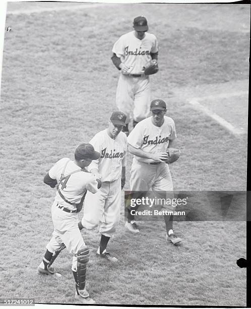 Bob Feller walks off the mound at Cleveland, July 8th, after defeating the Baltimore Orioles, 4-1, and striking out five batters to raise his...