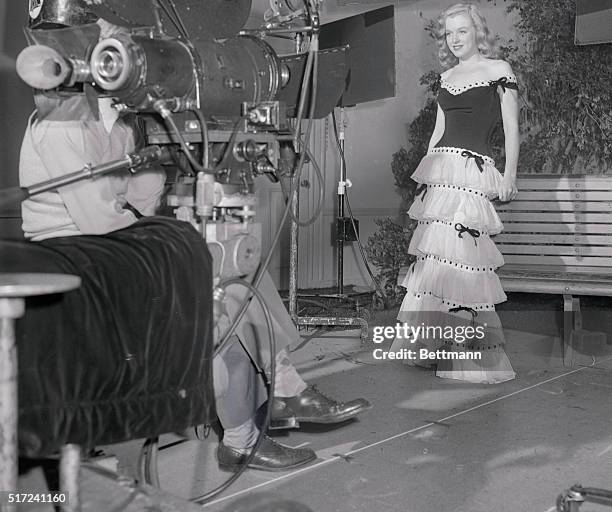 Marilyn Monroe undergoing a screen test in a puffy skirt, early in her career, when she was making Scudda Hoo! Scudda Hay!