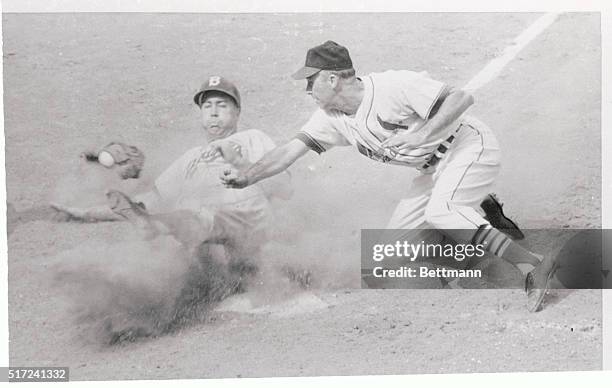 Brooklyn Dodger outfielder Duke Snider knocks the ball and glove off the hand of St. Louis Cardinal hurler, Royce Lint in the eighth inning of the...